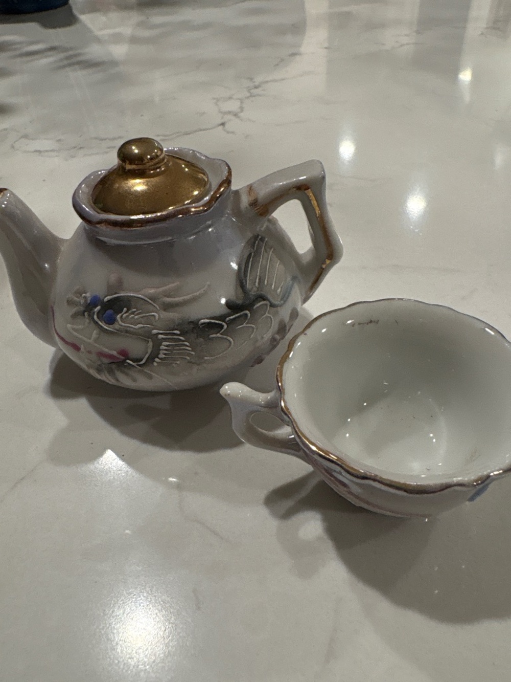 Vintage Miniature Dragon Moriage teapot and cup